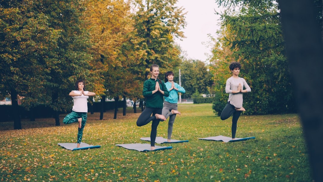 senior yoga in park